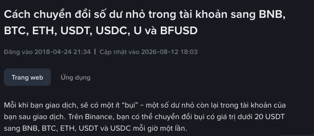 Ảnh chụp trang hỗ trợ tiếng Việt của Binance tiêu đề "Cách chuyển đổi số dư nhỏ trong tài khoản sang BNB, BTC, ETH, USDT, USDC, U và BFUSD", cập nhật ngày 12/08/2026, nêu quy tắc chuyển đổi bụi dưới 20 USDT mỗi giờ một lần